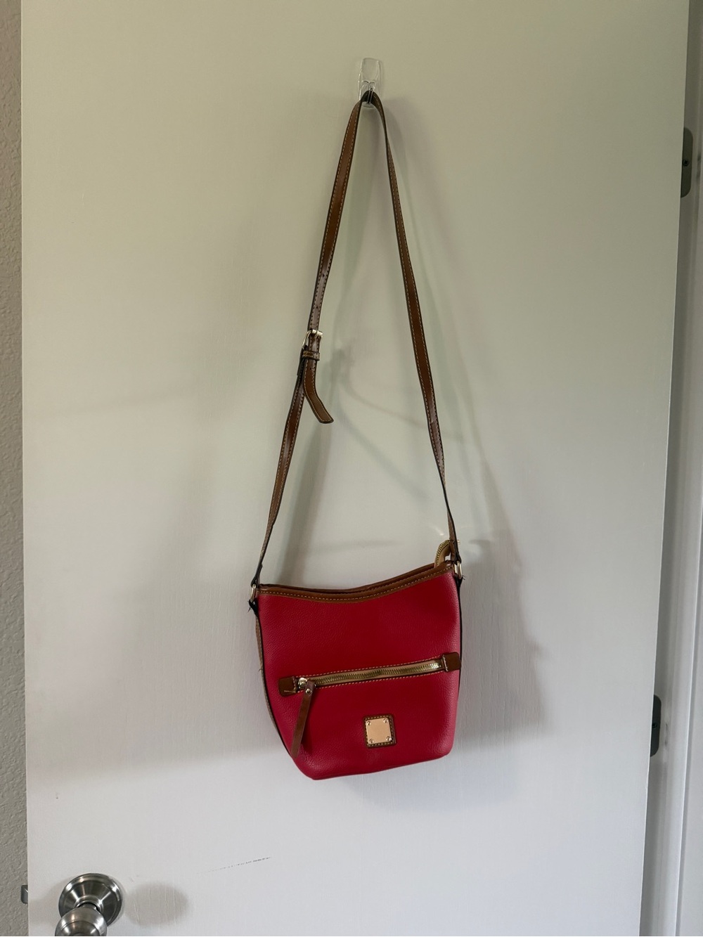 Red Leather Crossbody Travel Bag with Brown Trim